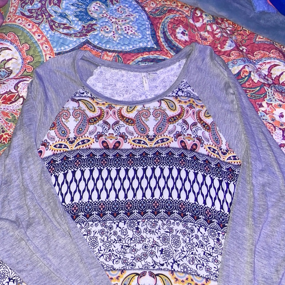 A XL blouse with a design on the front